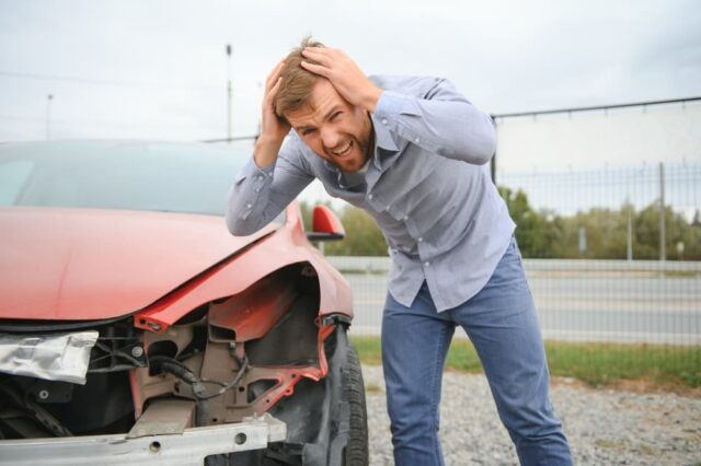 Distressed driver after a traffic accident.