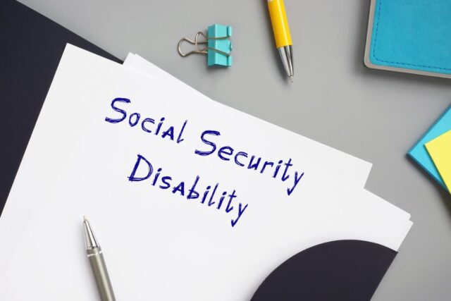 Text reading 'Social Security Disability' on a piece of paper.