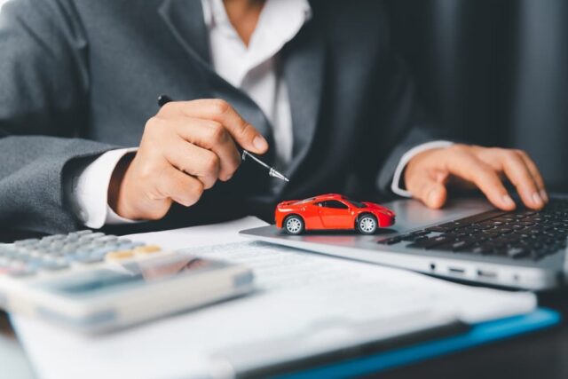 Concept of car insurance business, saving buy with tax.